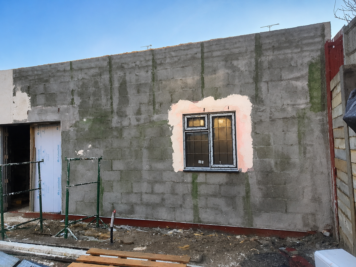 Before — House facade before external rendering work