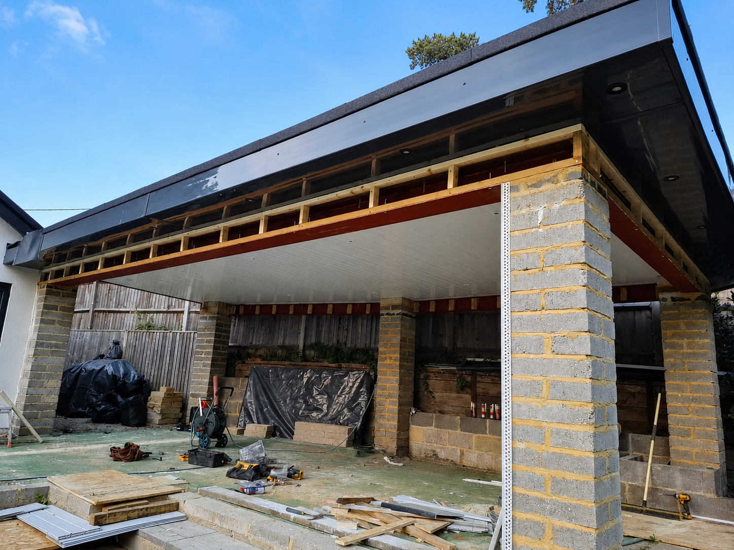 Covered terrace with a timber roof structure